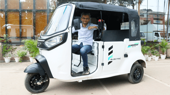An Euler Motors HiLoad EV commercial three-wheeler on a delivery run